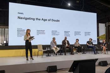 A panel of six people discusses